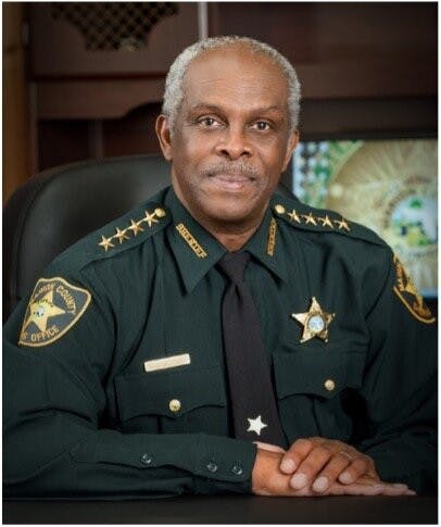 Sheriff Emery Gainey is pictured above.