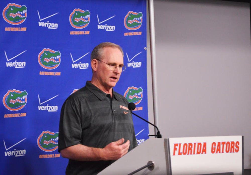 <p>Offensive line coach Mike Summers at a press conference in Ben Hill Griffin Stadium.&nbsp;</p>