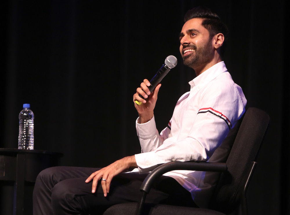 Hasan Minhaj, a 33-year-old comedian known for his time as a correspondent on “The Daily Show” and his Netflix show “Patriot Act with Hasan Minhaj,” answers questions Thursday at the &nbsp;Phillips Center for the Performing Arts. Around 1,750 attendees watched Minhaj answer questions asked by UF School of Journalism and Communications professor Mike Foley.
