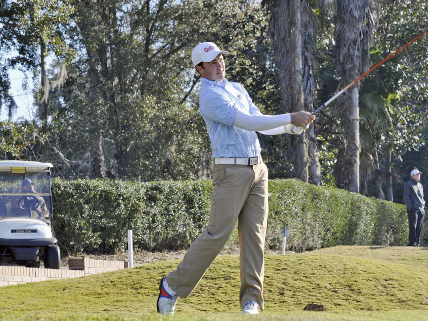 UF's A.J. Crouch follows through on his backswing at the 2015 SunTrust Gator Invitational on Feb. 14, 2015 at the Mark Bostick Golf Course.&nbsp;