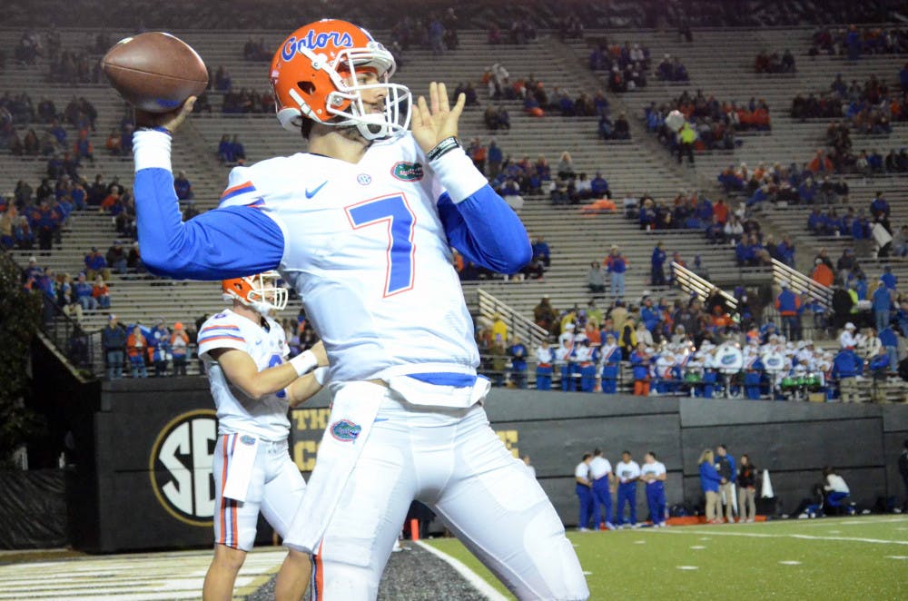 <p>Will Grier warms up prior to Florida's game against Vanderbilt on Nov. 8 in Nashville, Tennessee.</p>