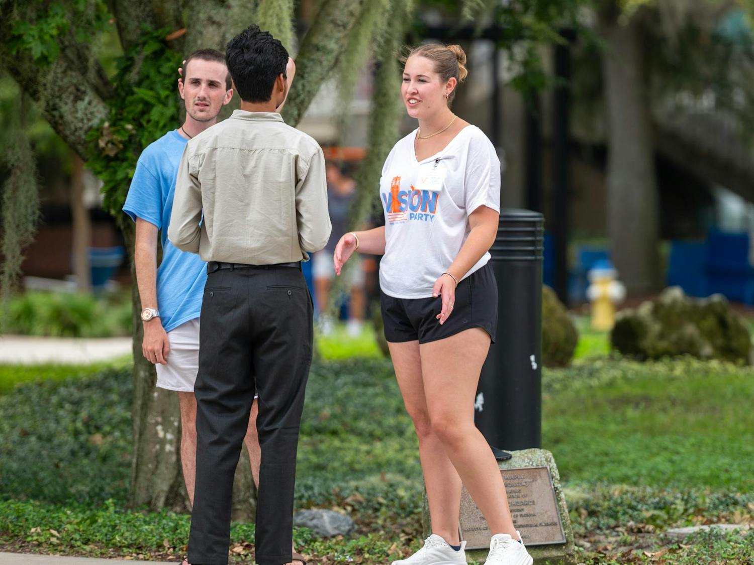 Members of the Vision Party campaign to students around the UF campus in Gainesville, Fla., on Tuesday, Sept. 30, 2025. This is the first election in recent years in which only one party is running.