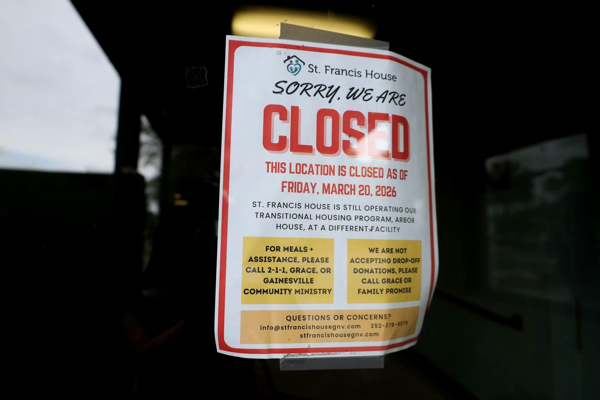 A poster announcing the closure of St. Francis House in downtown Gainesville, Fla. on March 29, 2026.
