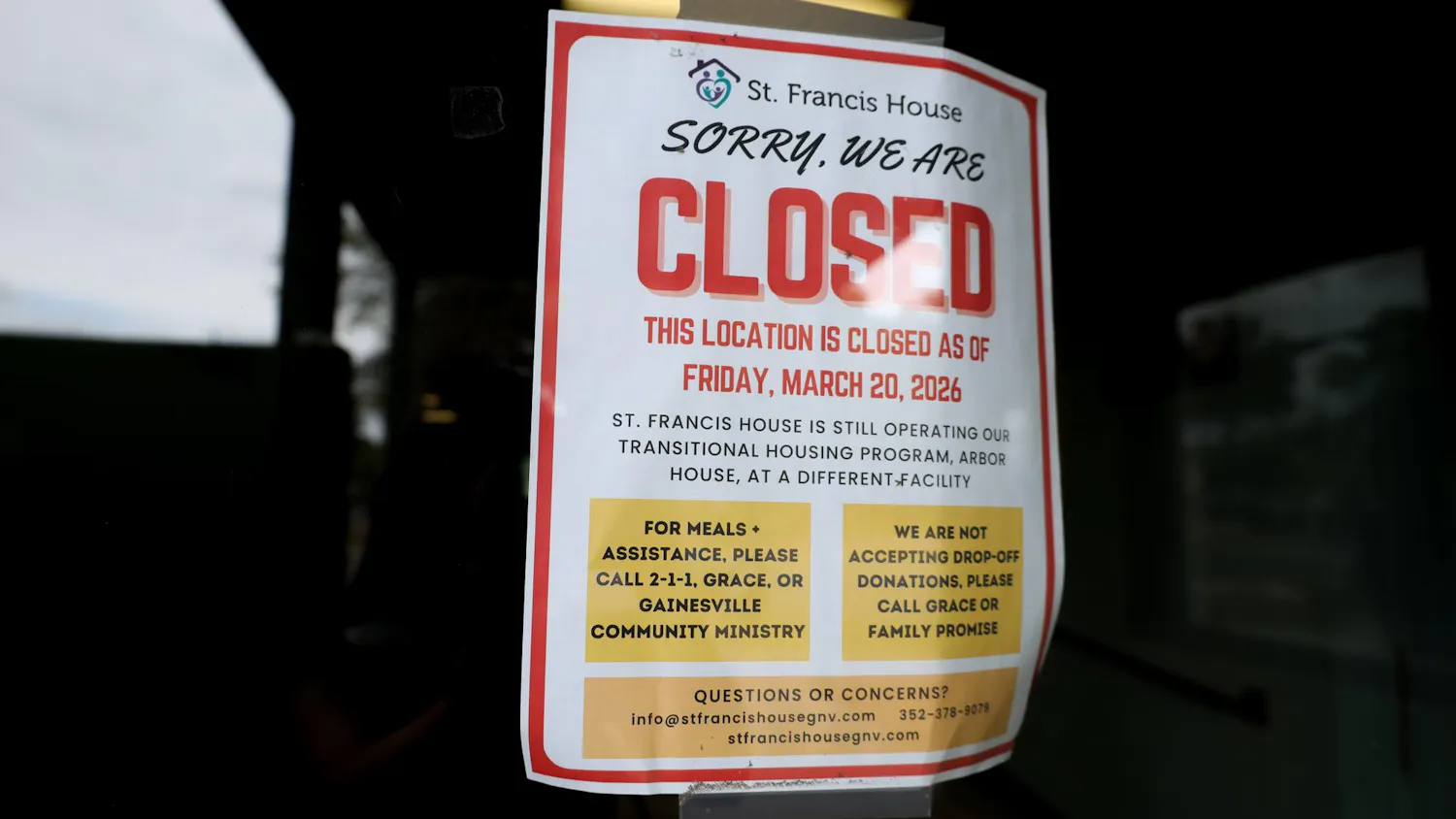 A poster announcing the closure of St. Francis House in downtown Gainesville, Fla. on March 29, 2026.