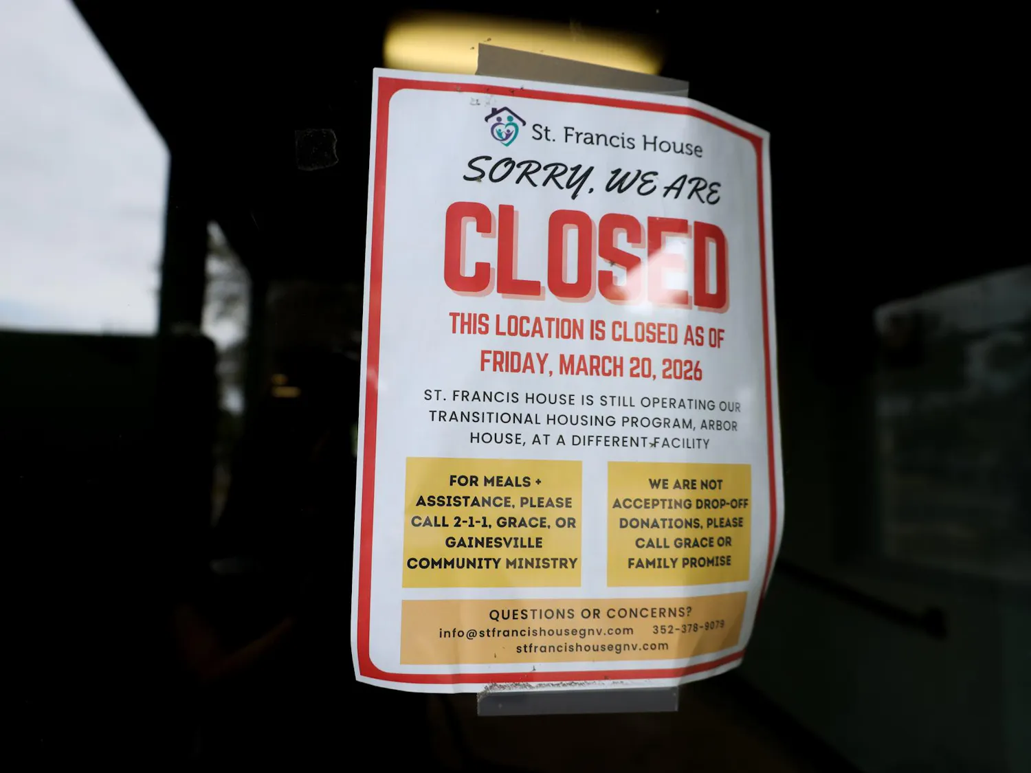 A poster announcing the closure of St. Francis House in downtown Gainesville, Fla. on March 29, 2026.