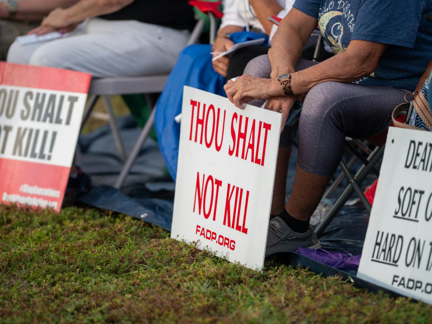 Protestors hold signs outside of the Florida State Prison in Starke in opposition to the execution of. Victor Tony Jones. Jones was executed on Sept. 30, 2025