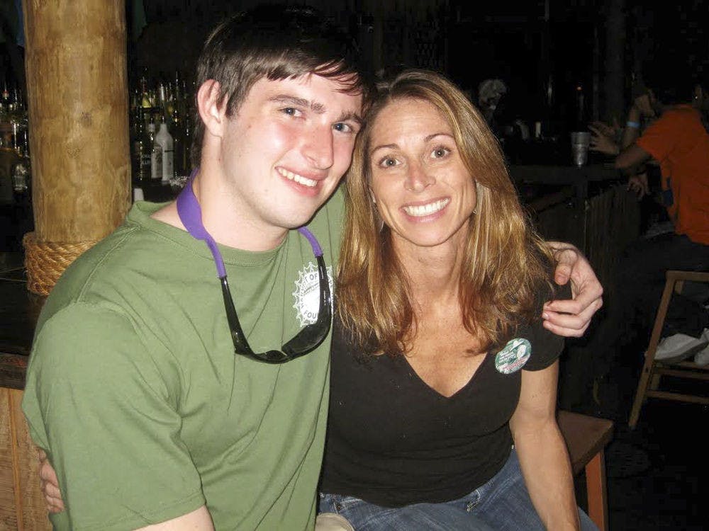 <p>Thomas Coady poses for a photo with his mother, Maria Coady.</p>