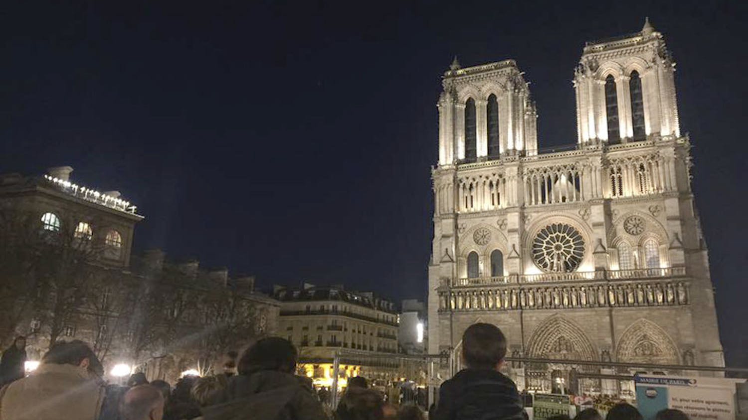 Thousands of people attended a memorial service at Notre Dame Cathedral in Paris on Nov. 15, 2015. Children sat on their parents' shoulders and old ladies stood outside the church, watching the service live-streamed on their phones. "It was a very impactful moment," said Pedro Perez, a 20-year-old UF history and political science junior studying abroad in France, who took the photo.