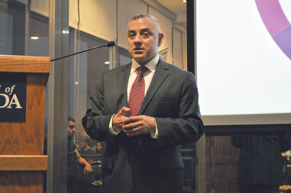 Retired Marine Sgt. Eric Alva speaks at Pride Awareness Month’s opening ceremonies on Monday. Alva, 43, was the first U.S. Marine injured in the Iraq War when he stepped on a landmine after being in Iraq for 3 hours, and helped to repeal Don’t Ask Don’t Tell. “The norm is about being happy and letting people live their lives,” he said.
Correction: The original cutline identified Sgt. Alva as a soldier, not a marine.