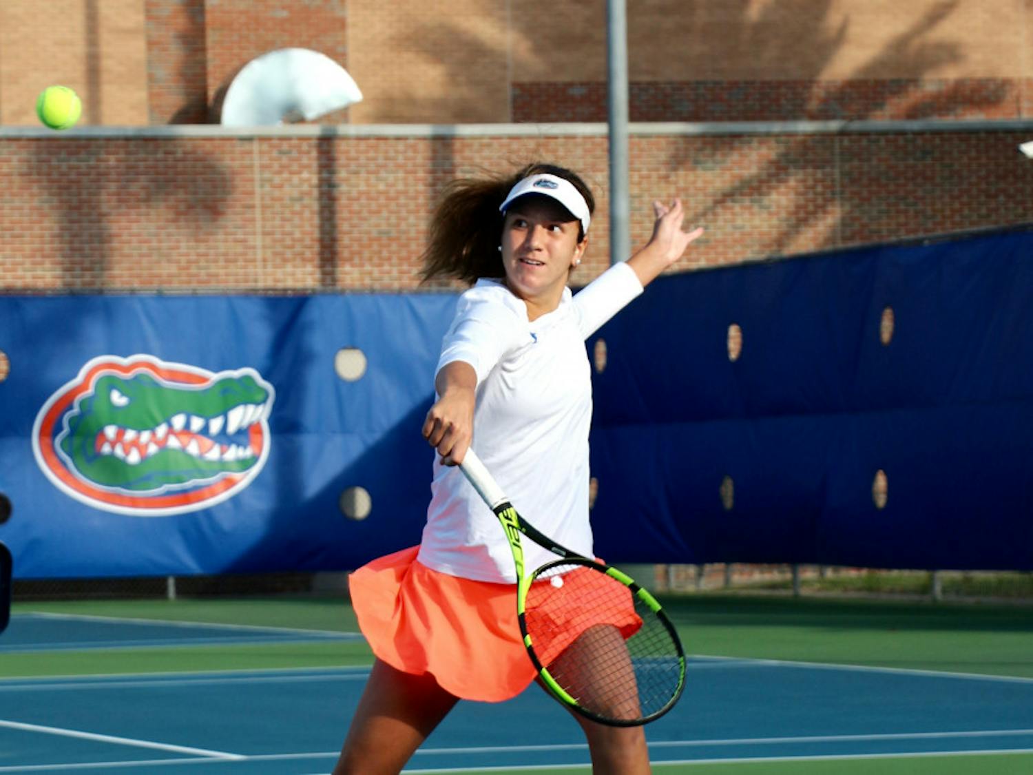 Anna Danilina returns a backhand during Florida's 4-2 win against Oklahoma State on Feb. 18, 2017, at the Ring Tennis Complex.