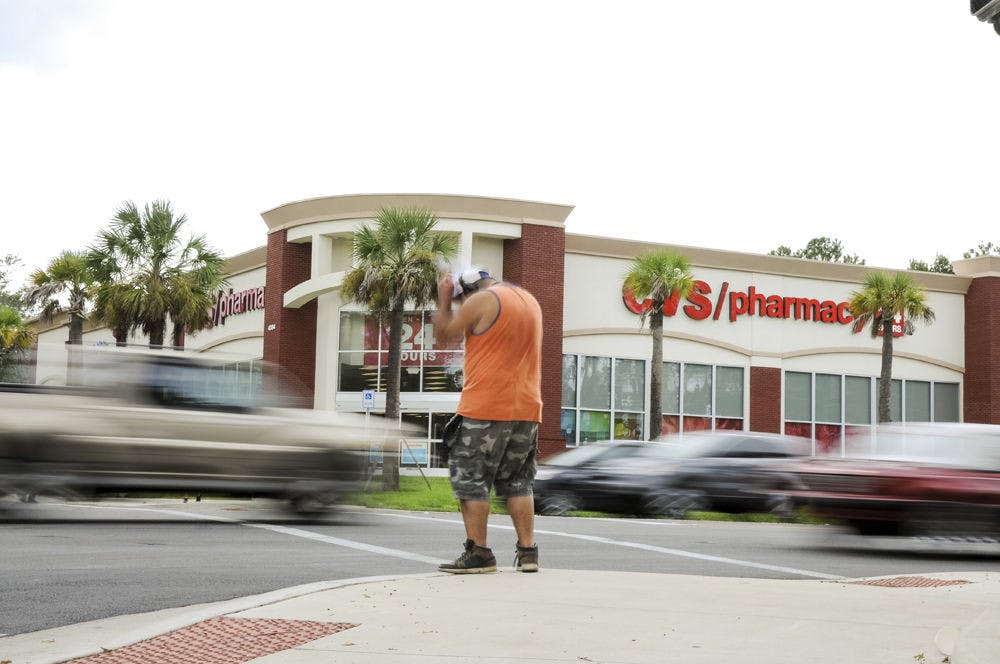 Dj Raffy performs at the corner of Northwest 16th Avenue and Northwest 43rd Street. "I do it to entertain people,” he said. “I do it to make people happy."