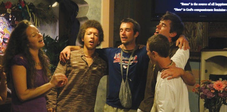 A group of Hare Krishnas chant and dance at the 12-hour Kirtan of the Musical Meditation Festival on Saturday at the Krishna House, 214 NW 14th St.