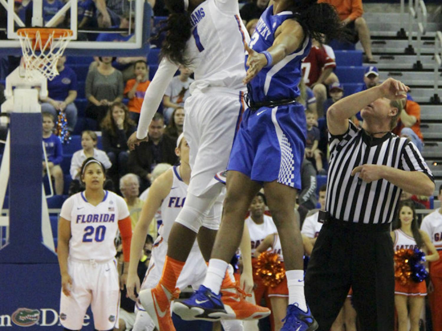 Ronni Williams jumps during the tipoff of Florida's 85-79 win over Kentucky on Jan. 31, 2016, in the O'Connell Center.