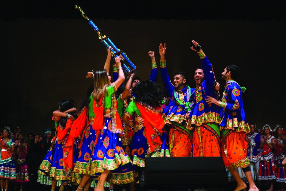 <p><span id="docs-internal-guid-399cabe5-f571-8f54-d01e-363ef0018446"><span>UF’s GatoRaas dance team celebrates a win Feb. 4 at the Raas Mania competition at the University of Illinois at Urbana-Champaign. The team went to five competitions for the 2016-17 season.</span></span></p>