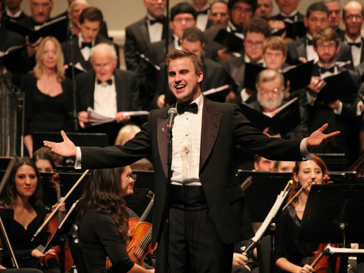 An orchestra and choir perform at last year’s annual holiday concert at the Phillips Center for the Performing Arts. This year’s theme is “Bells of Remembrance,” and it reflects the performance date’s intersection with Pearl Harbor Remembrance Day.
