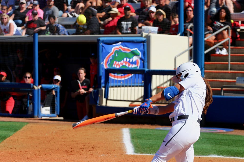 <p>Janell Wheaton swings during Florida's 5-0 win against Georgia on April 8, 2017, at Katie Seashole Pressly Stadium.</p>