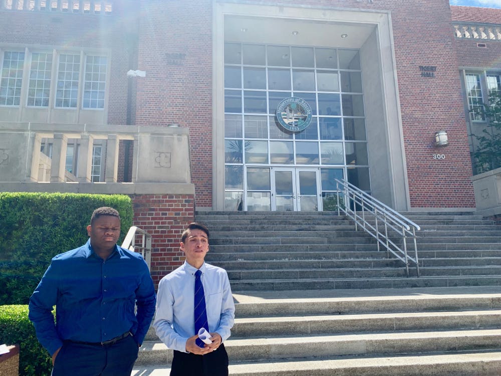 <p>Anthony Rojas, a 23-year-old UF political science master’s student, and Mackintosh Joachim, president of the UF chapter of the NAACP, announced a boycott of the university-wide commencement ceremony on Friday afternoon outside Tigert Hall.</p>