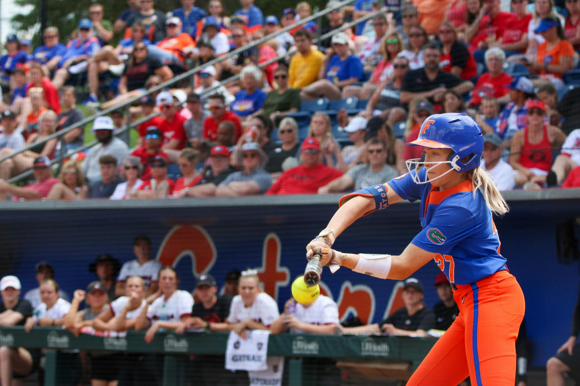 Florida outfielder Kendra Falby checks her swing as the Gators beat the Georgia Bulldogs 8-7 Saturday, April 15, 2023.