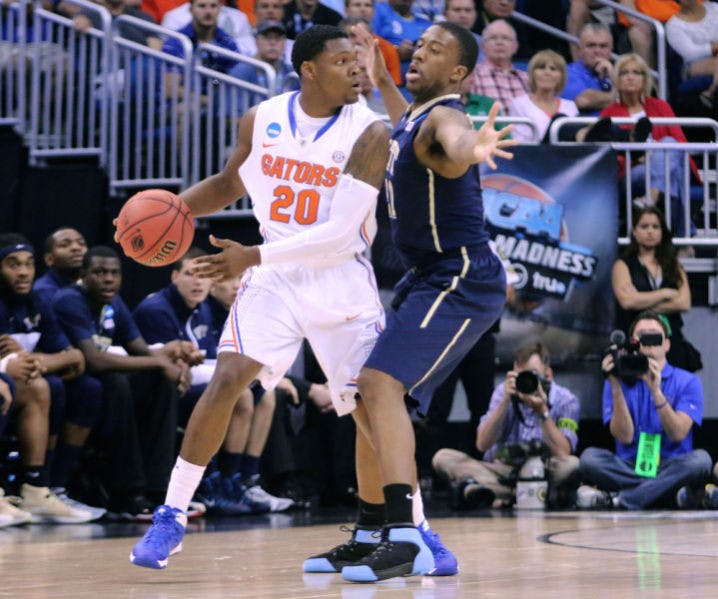 Michael Frazier II drives the ball during Florida’s 61-45 win against Pittsburgh during the 2014 NCAA Tournament.&nbsp;