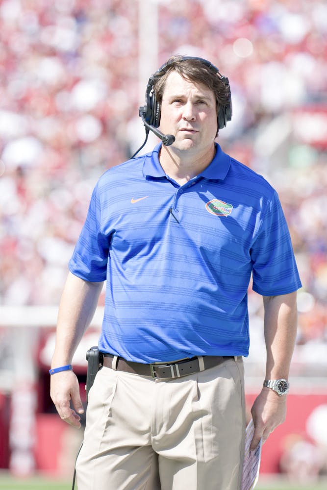 Will Muschamp looks down the field during Florida's 42-21 loss to Alabama on Sept. 20 at Bryant-Denny Stadium.
