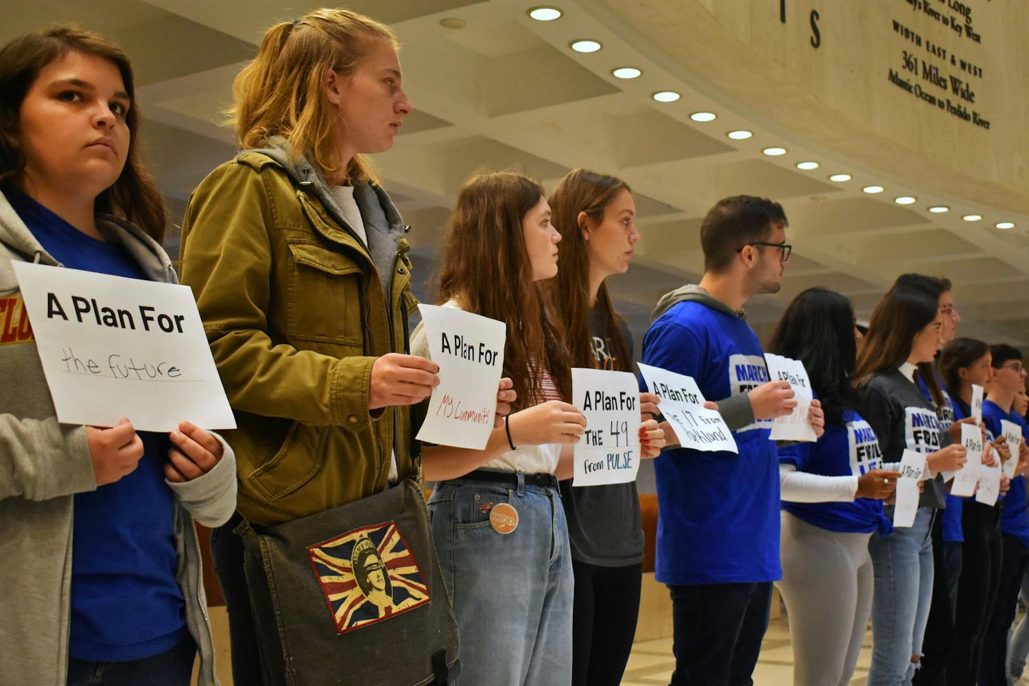 Students and activists demonstrated inside the Florida State Capitol building Thursday, holding filled-in signs representing what the Peace Plan for a Safer Florida means to them.&nbsp;