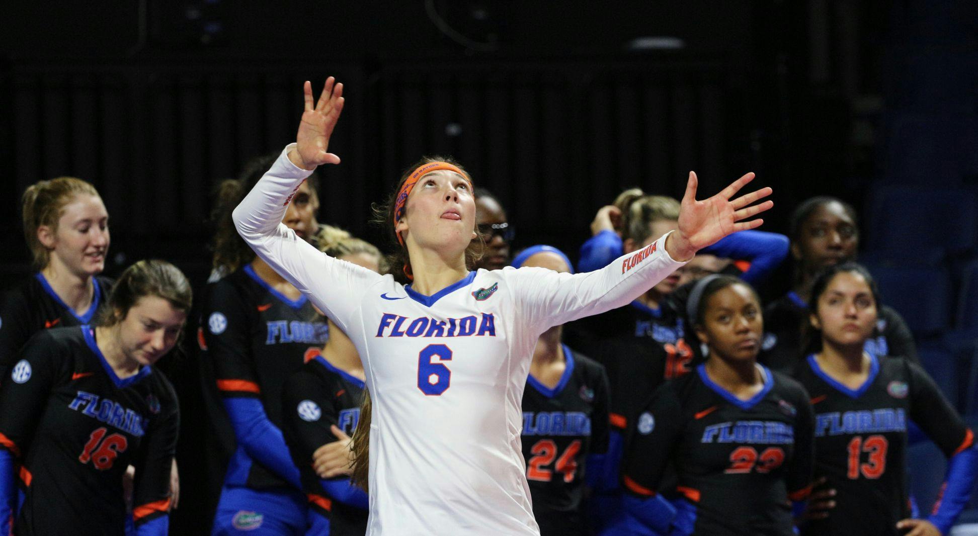 UF libero Caroline Knop serves the ball during Florida's 3-0 win against Florida A&amp;M on Friday at the O'Connell Center.