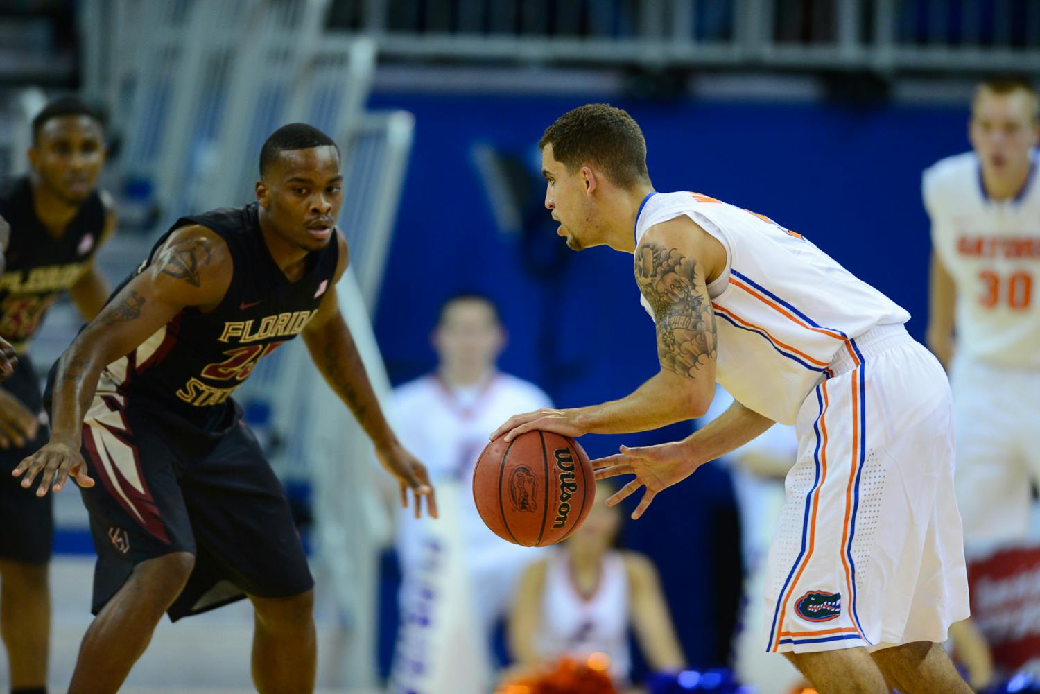 Senior point guard Scottie Wilbekin takes up the ball during No. 15 Florida's 67-66 win against Florida State on Nov. 29 in the O'Connell Center.