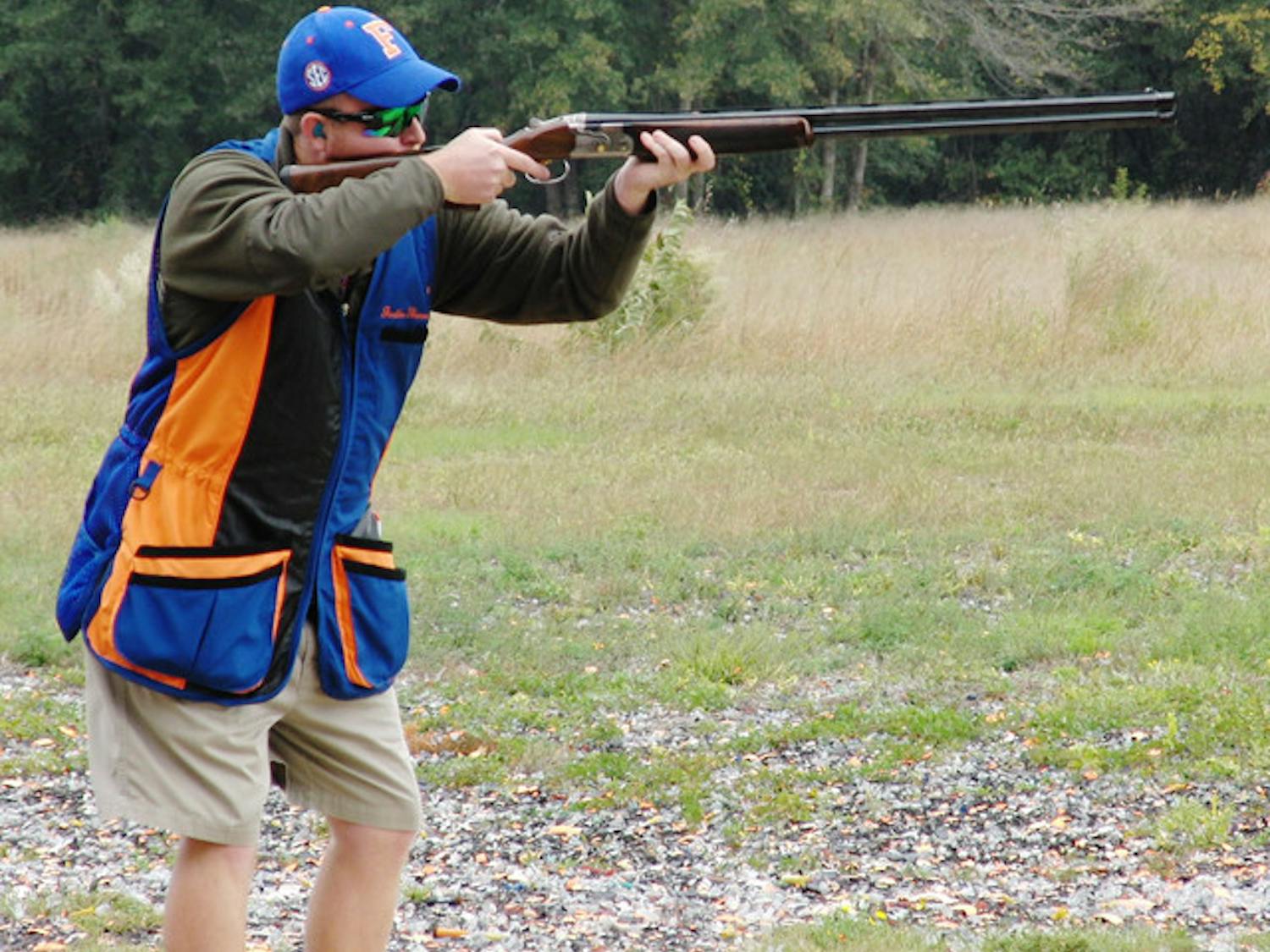 Florida Gators Trap, Skeet and Sporting team member Justin Thomas, 23, competes in a shooting competition in Jacksonville on Saturday.