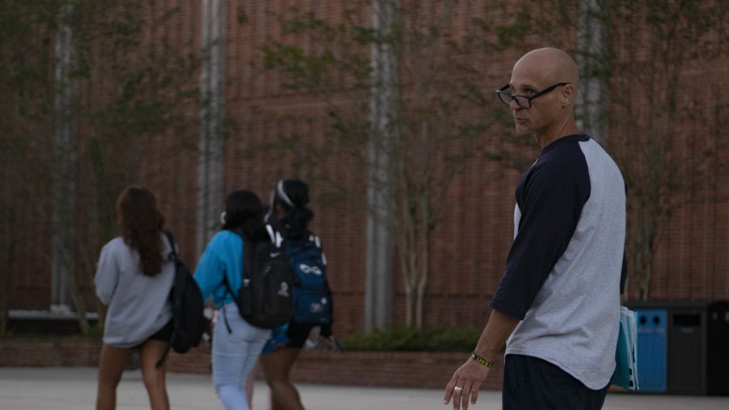 A petitioner looks for people to sign the blue petition outside the Reitz Union on Thursday, Oct. 28, 2021. "This is a good cause," he said. "The Seminoles are getting jerked around by the government." He warned that the green petition is not a good one.