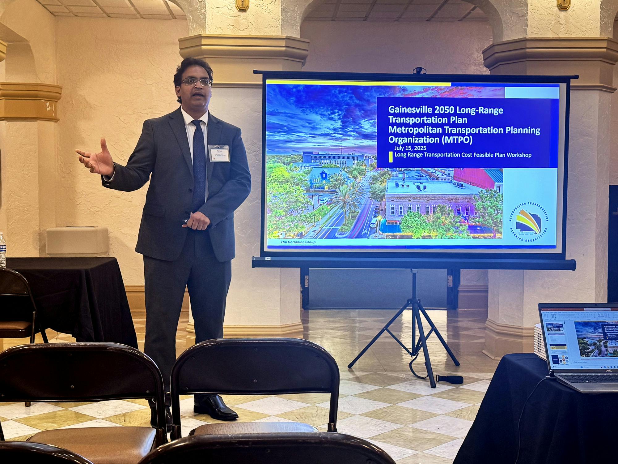 Srin Varanasi presents a transportation proposal at a public workshop held on Tuesday, July 15, 2025.