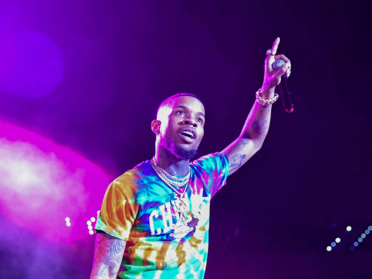 Tory Lanez sings his first song to the audience at the O'Connell Center Monday night, but stops in between songs to smile at the crowd. More than 3,000 people came to see Lanez perform.