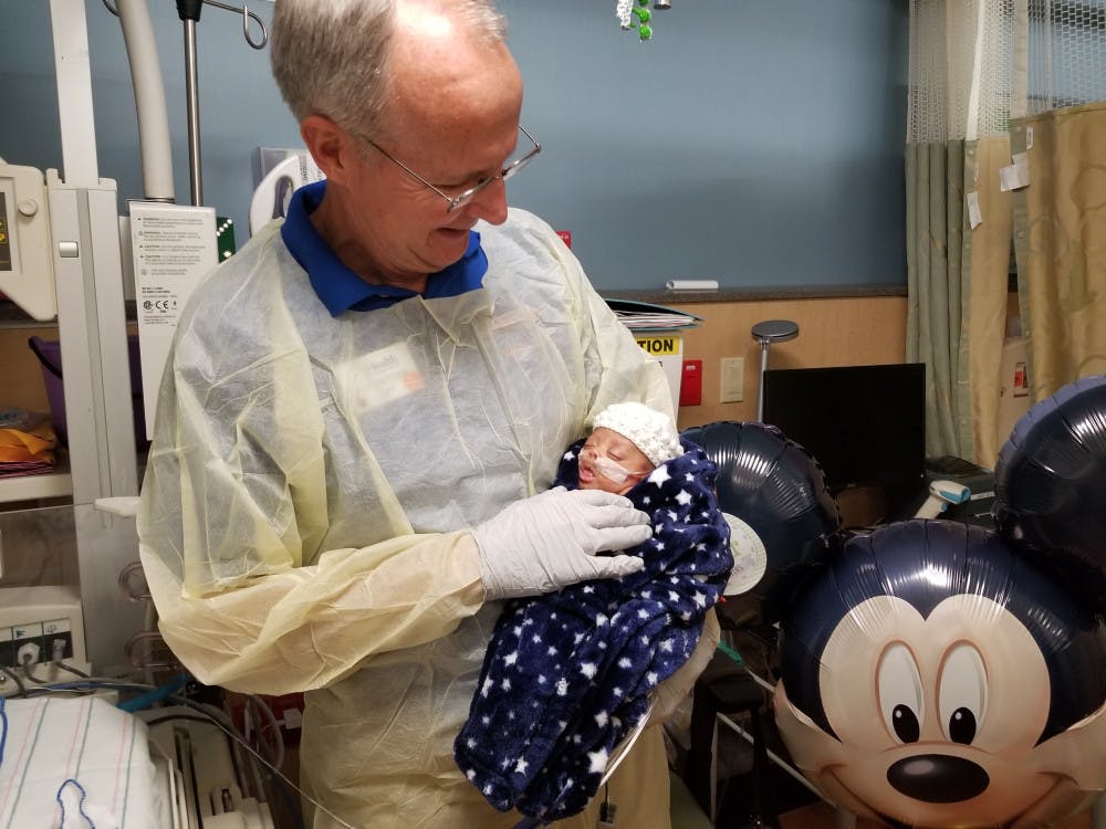 Cliff Preston, 63, was nominated for the NASCAR Foundation Betty Jane France Humanitarian Award for his volunteer work as a baby cuddler at UF Health Shands Hospital in the neonatal intensive care unit. 
