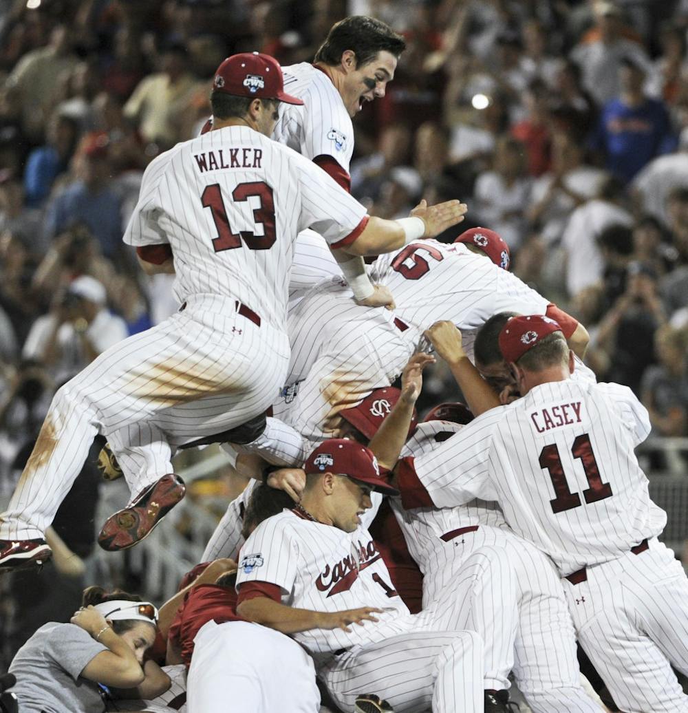 <p>South Carolina players celebrate after beating Florida 5-2 in
Game 2 of the NCAA baseball College World Series best-of-three
finals.</p>