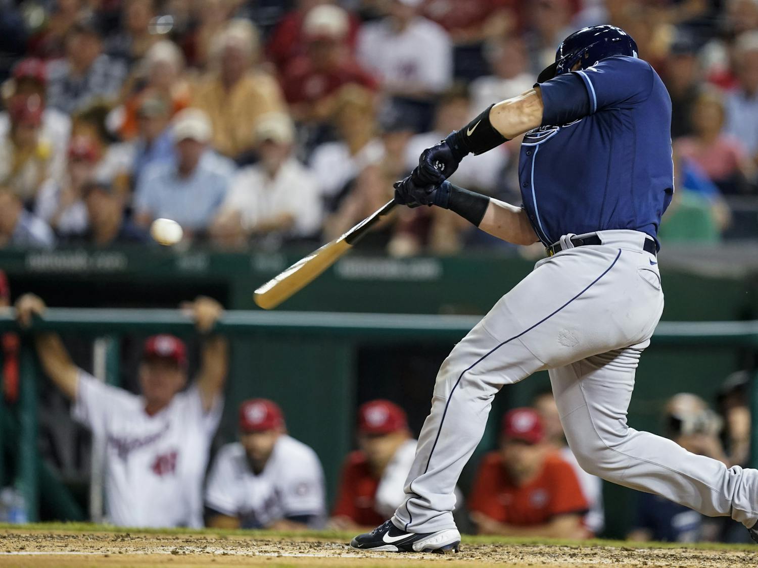 Tampa Bay Rays' Mike Zunino hits a solo home run during the ninth inning of a baseball game against the Washington Nationals at Nationals Park, Tuesday, June 29, 2021, in Washington. (AP Photo/Alex Brandon)