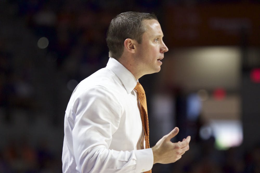 <p>UF coach Mike White looks on in Florida's 68-66 loss to Vanderbilt on Jan. 21, 2017, at the O'Connell Center.</p>
