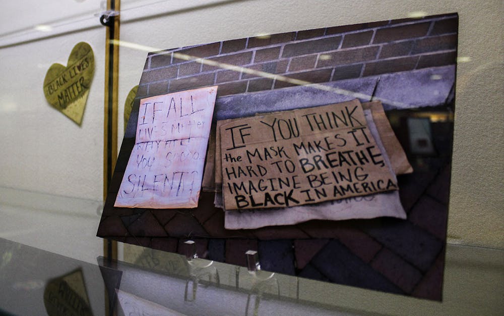 <p>The “All Black Lives Matter: Documenting Community Response to Racial Injustice” exhibit sits in Library West on Monday, Jan. 11, 2021. It will be open until March.</p>