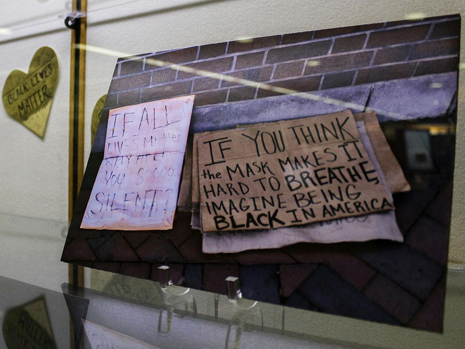 The “All Black Lives Matter: Documenting Community Response to Racial Injustice” exhibit sits in Library West on Monday, Jan. 11, 2021. It will be open until March.