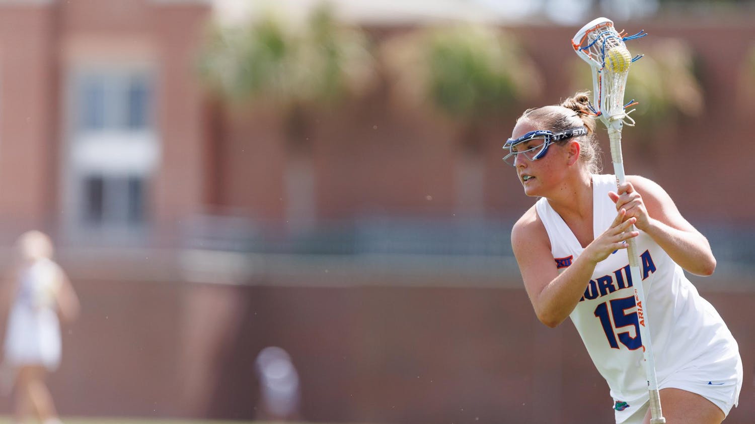Florida midfielder Caroline Hoskins (15) cradles the ball during the second quarter of an NCAA women’s lacrosse game against Mercer, Saturday, March 07, 2026, in Gainesville, Fla.