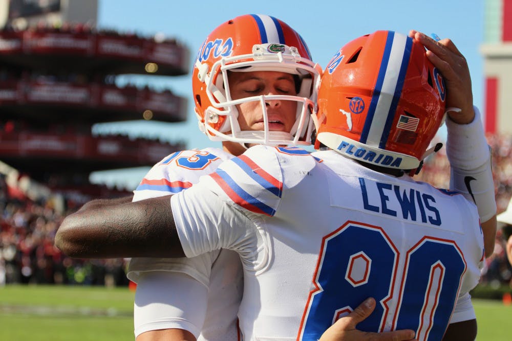 <p>Florida quarterback Feleipe Franks (left) completed 10 of 25 passes for 174 yards, no touchdowns and one interception on Saturday against South Carolina. UF fell to the Gamecocks, 28-20, sending its losing streak to five straight games.</p>