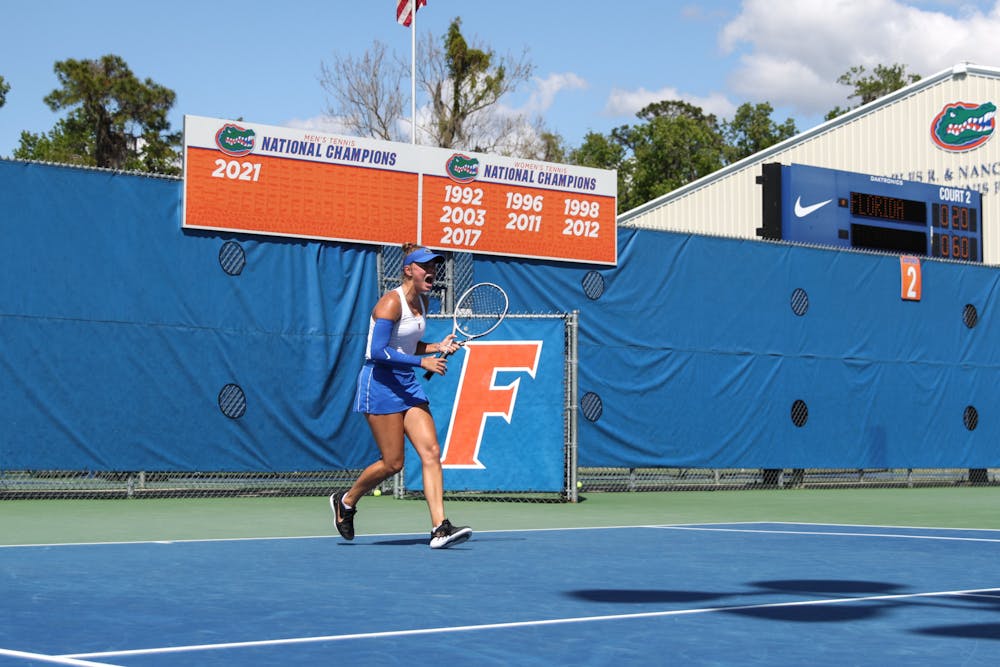 Florida sophomore Bente Spee celebrates during the Gators' 4-1 win against the No. 3 Michigan Wolverines Wednesday, March 22, 2023.