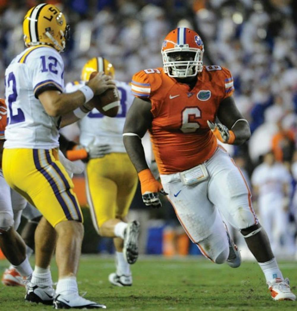 <p>Florida defensive lineman Jaye Howard, a senior, said defensive line coach Bryant Young, 39, could still suit up and play despite his age.</p>
