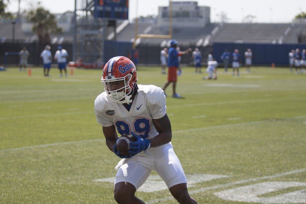 <p>UF wide receiver Tyrie Cleveland runs with the ball during a spring practice at the Sanders Practice Field on March 22, 2017.</p>
