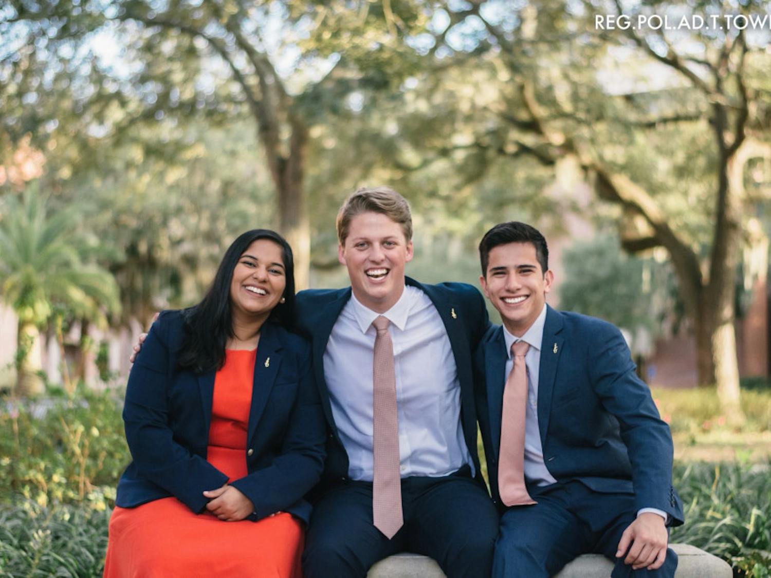 Impact Party's executive ticket consists of Michael Murphy, 21, for Student Body president (center); Sarah Abraham, 20, for Student Body vice president (left); and Santiago Gutierrez, 20, for Student Body treasurer (right).