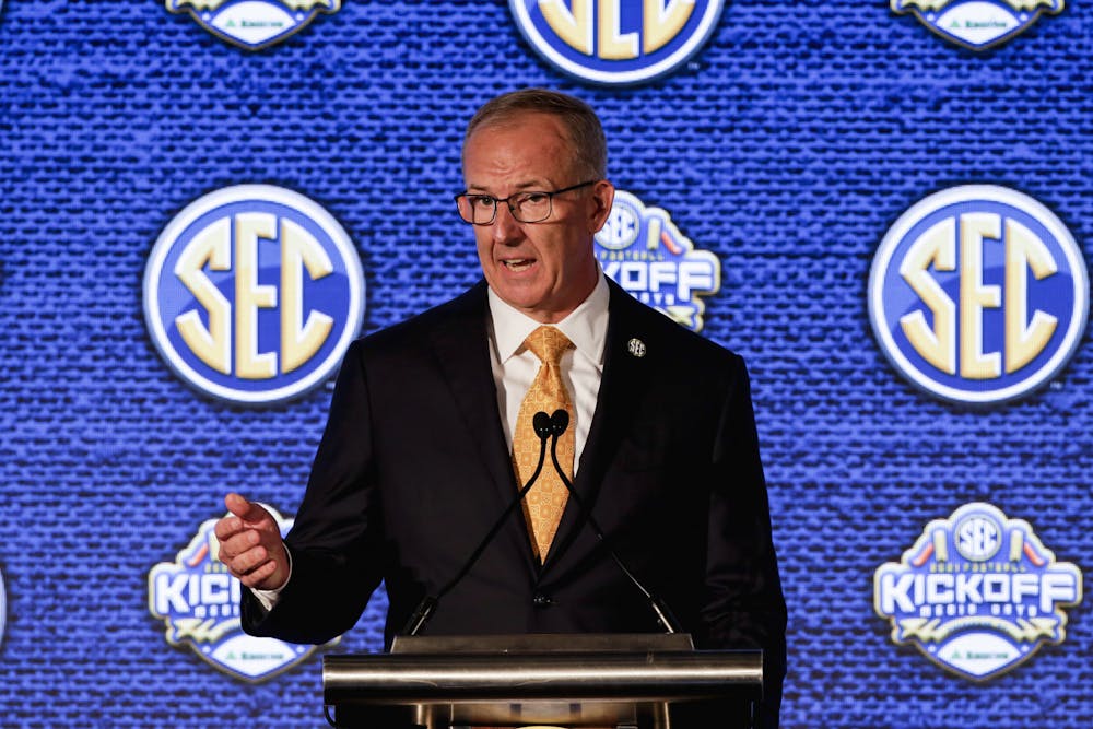 SEC Commissioner Greg Sankey speaks to reporters during the NCAA college football Southeastern Conference Media Days Monday, July 19, 2021, in Hoover, Ala. (AP Photo/Butch Dill)