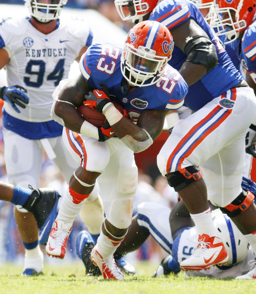 Senior running back Mike Gillislee runs down the field against Kentucky on Sept. 22 at Ben Hill Griffin Stadium. Florida gained 200 yards rushing while allowing 159 yards.