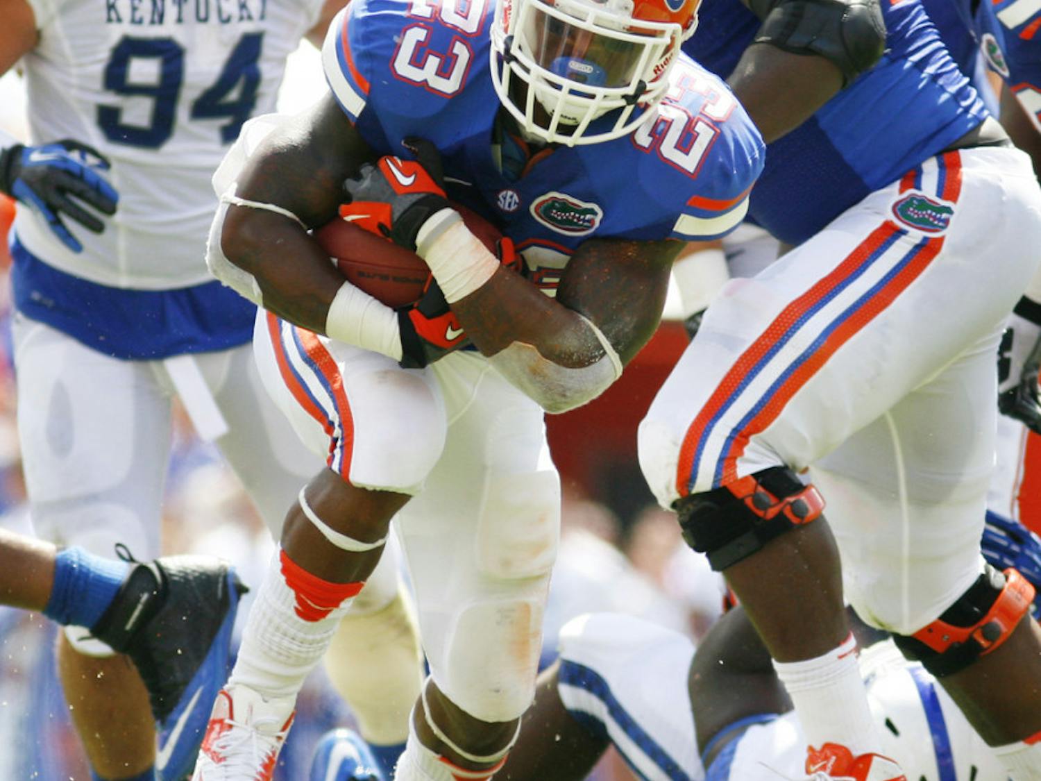 Senior running back Mike Gillislee runs down the field against Kentucky on Sept. 22 at Ben Hill Griffin Stadium. Florida gained 200 yards rushing while allowing 159 yards.