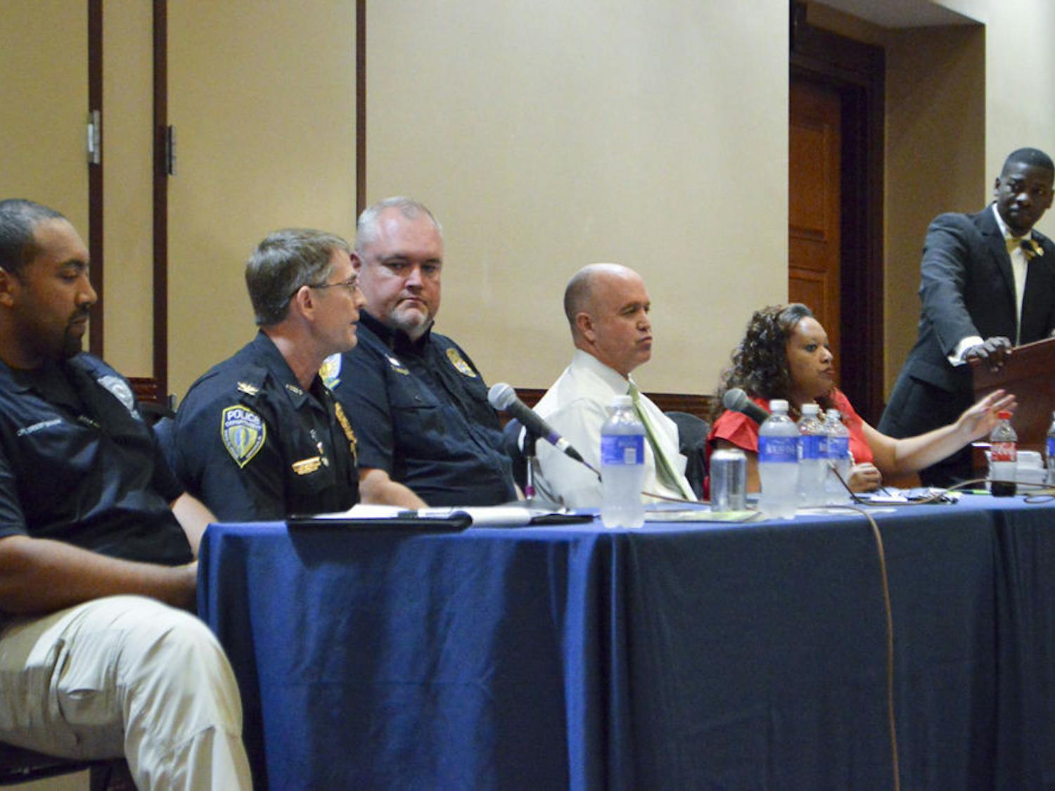 (From left) Santa Fe College Chief Ed Book, University Police Deputy Chief Darren Baxley, Gainesville Police Chief Tony Jones and UF leaders hold a forum Thursday night to discuss police brutality around the country in the Reitz Union Grand Ballroom.