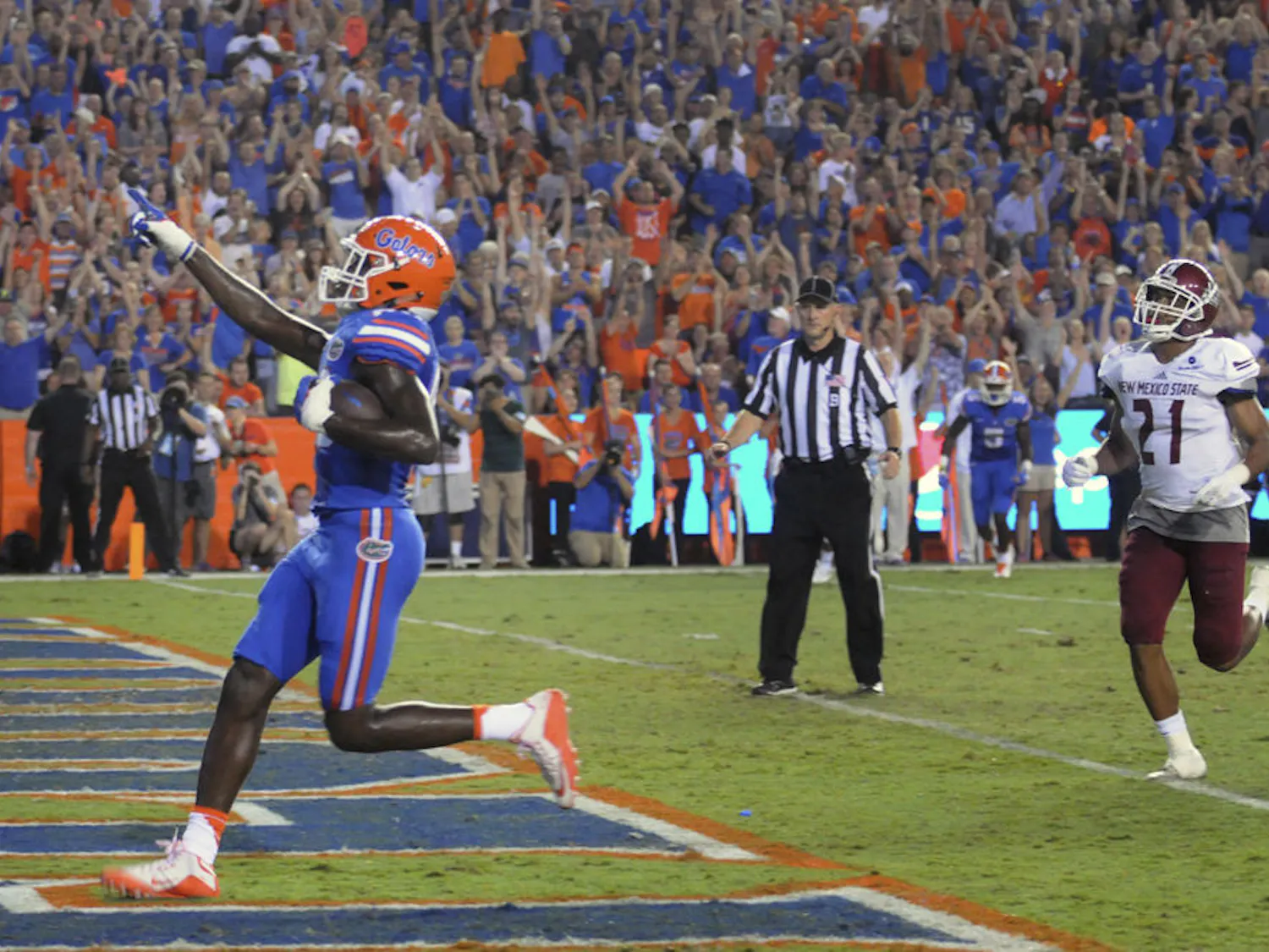 UF tight end C'yontai Lewis celebrates as he scores a touchdown during Florida's 61-13 win against New Mexico State on Saturday at Ben Hill Griffin Stadium.
