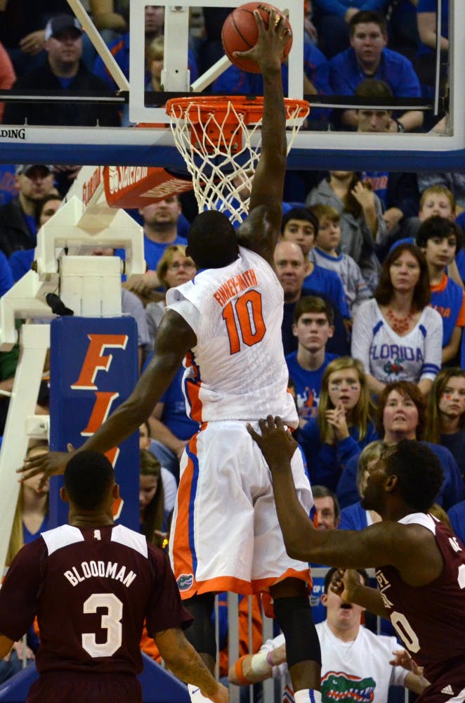 Dorian Finney-Smith dunks during Florida's 72-47 win against Mississippi State on Saturday in the O'Connell Center.