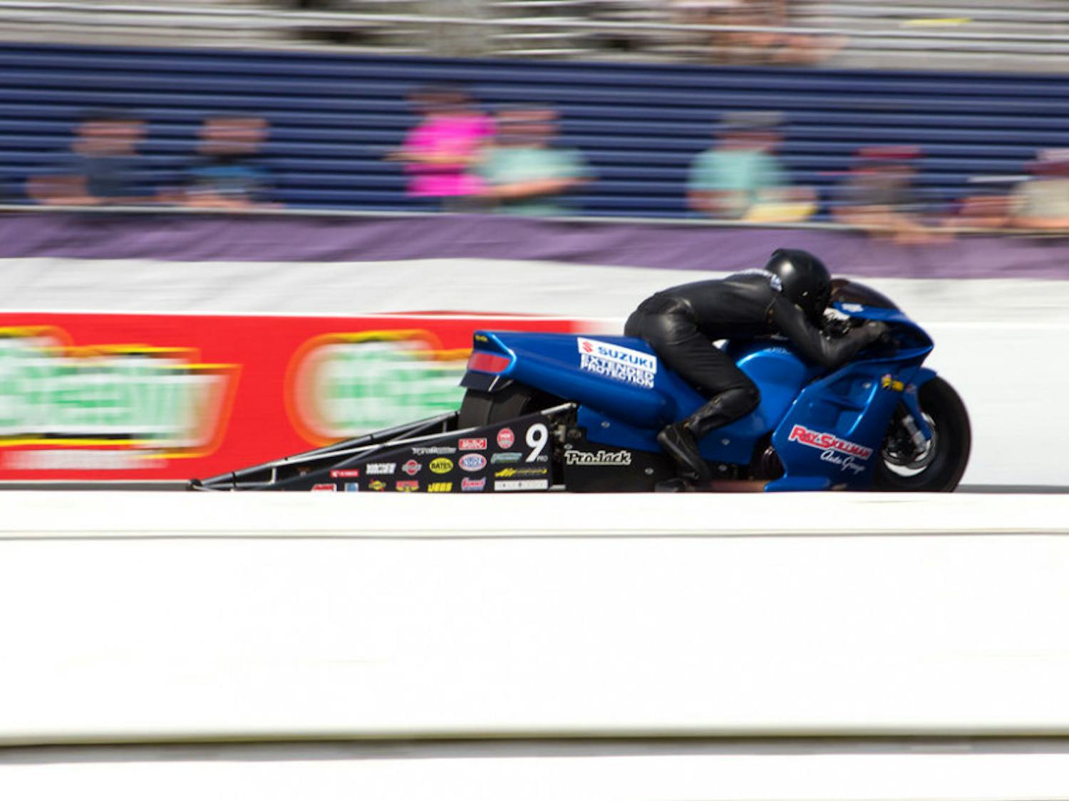 James Underdahl races down the track at Gatornationals on Saturday. The Pro Stock Motorcycle reached speeds up to 197 mph during the qualifying session.